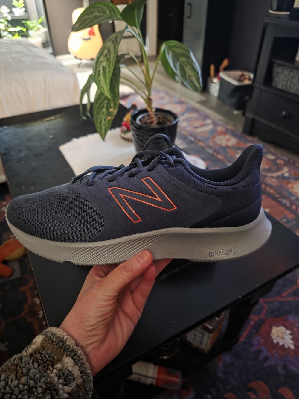 New Balance Navy Running Shoe with Orange Logo